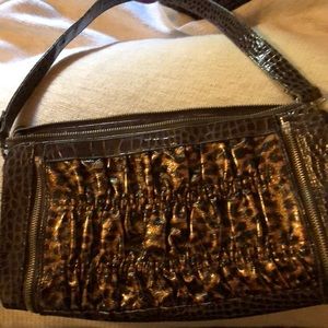 Chocolate, alligator-leopard  two-piece purse.
